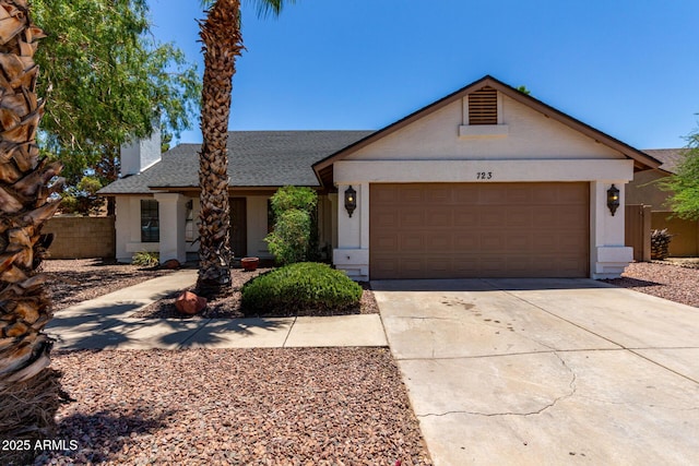 723 E Piute Ave, Phoenix, AZ 85024 - single story home with concrete driveway, roof with shingles, and an attached garage