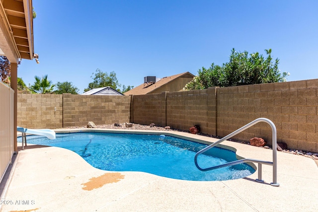 723 E Piute Ave, Phoenix, AZ 85024 - view of swimming pool with a fenced backyard, a water slide, and a patio