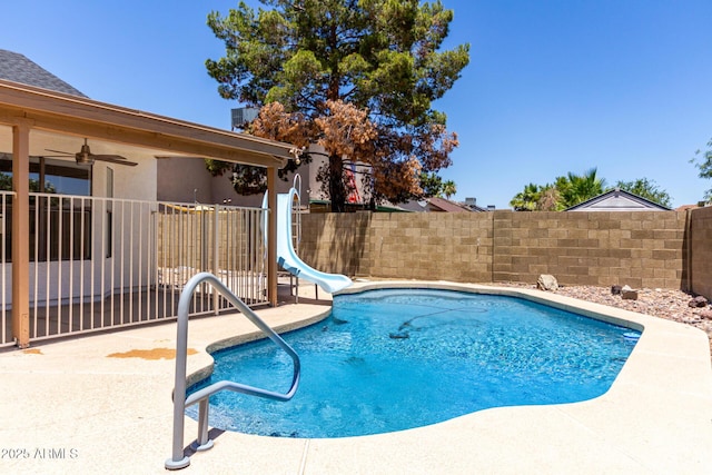 723 E Piute Ave, Phoenix, AZ 85024 - view of pool with a water slide, a fenced backyard, a patio area, and ceiling fan