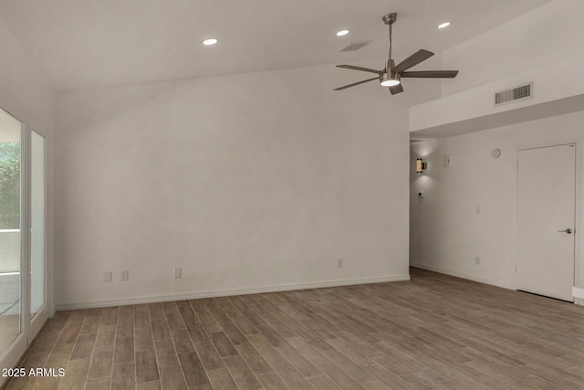 723 E Piute Ave, Phoenix, AZ 85024 - empty room featuring wood finished floors, a ceiling fan, recessed lighting, and lofted ceiling