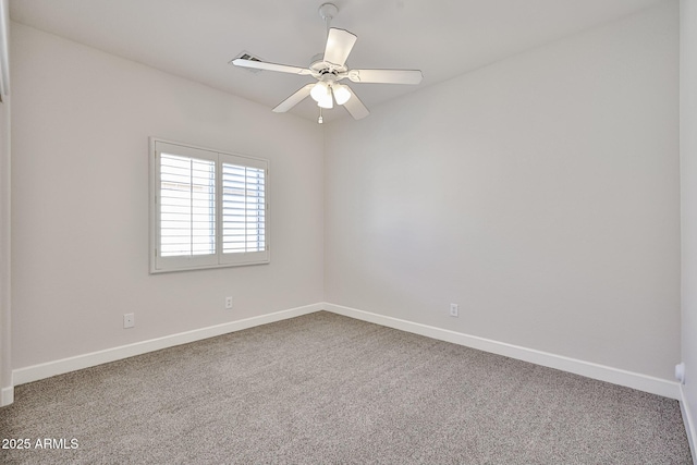 unfurnished room featuring baseboards, a ceiling fan, and carpet flooring