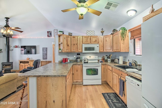 3047 Ponderosa Rd, Overgaard, AZ 85933 - kitchen with visible vents, a peninsula, white appliances, ceiling fan, and open floor plan