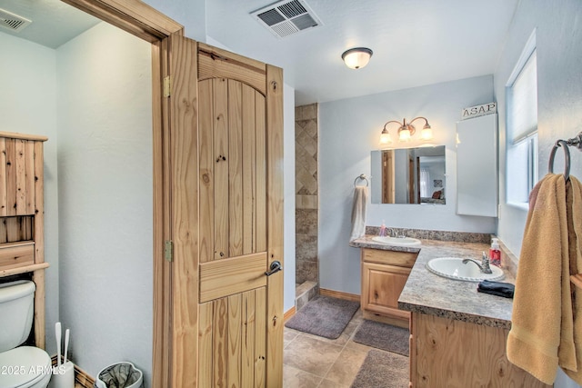 3047 Ponderosa Rd, Overgaard, AZ 85933 - full bathroom featuring toilet, a walk in shower, vanity, and visible vents
