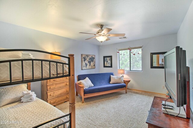 3047 Ponderosa Rd, Overgaard, AZ 85933 - bedroom with baseboards, visible vents, ceiling fan, and carpet