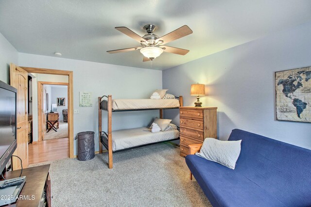 3047 Ponderosa Rd, Overgaard, AZ 85933 - carpeted bedroom featuring a ceiling fan