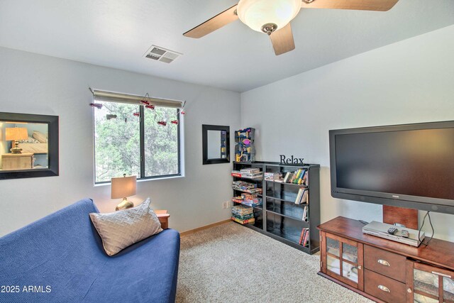 3047 Ponderosa Rd, Overgaard, AZ 85933 - sitting room featuring baseboards, carpet floors, ceiling fan, and visible vents