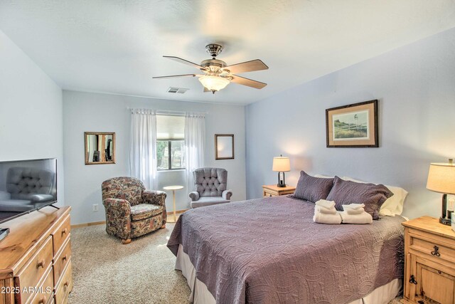 3047 Ponderosa Rd, Overgaard, AZ 85933 - bedroom featuring baseboards, visible vents, carpet, and a ceiling fan