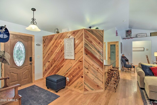 3047 Ponderosa Rd, Overgaard, AZ 85933 - foyer entrance featuring lofted ceiling and wood finished floors