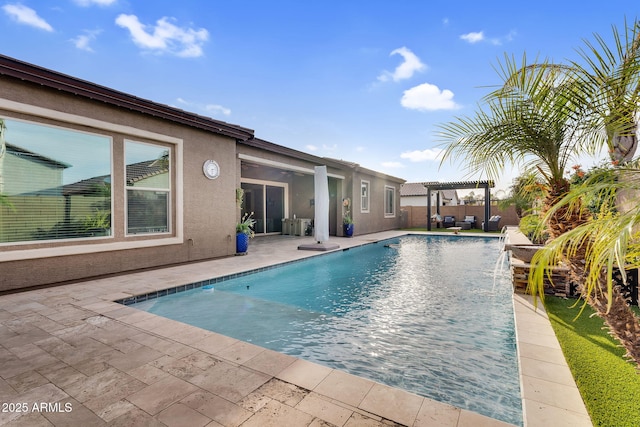 view of swimming pool featuring a fenced in pool, fence, a patio area, and a pergola