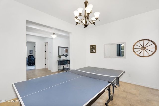 playroom with stone finish floor and baseboards