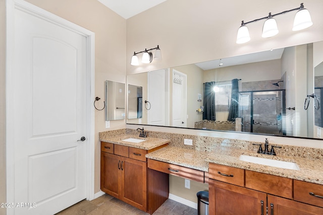 bathroom featuring vanity and a shower stall