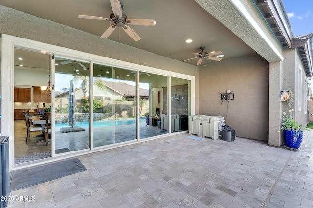 view of patio featuring a ceiling fan