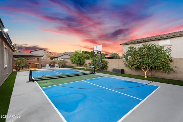 view of sport court with a fenced backyard