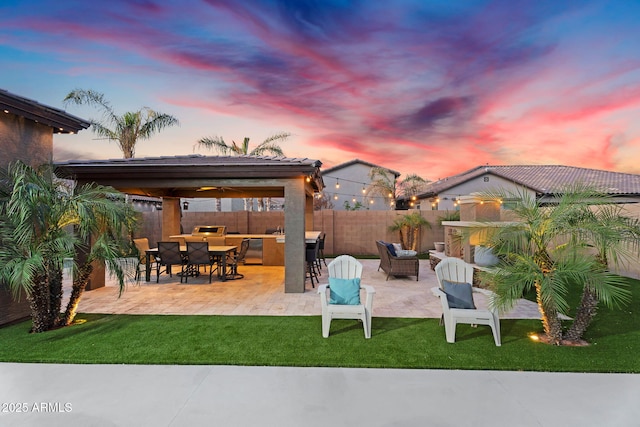 view of patio / terrace featuring a gazebo, a fenced backyard, and outdoor lounge area