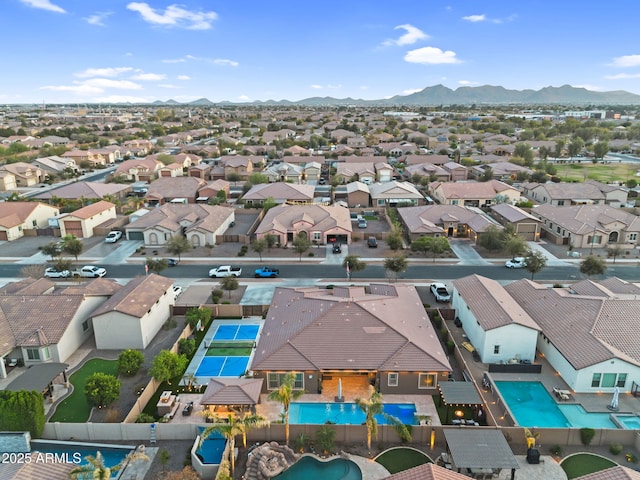 aerial view featuring a mountain view and a residential view