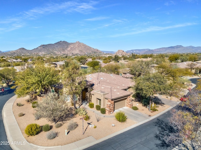 bird's eye view with a mountain view