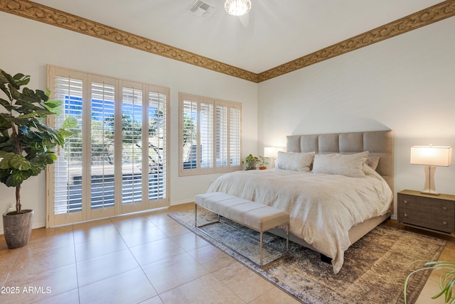 bedroom featuring light tile patterned floors