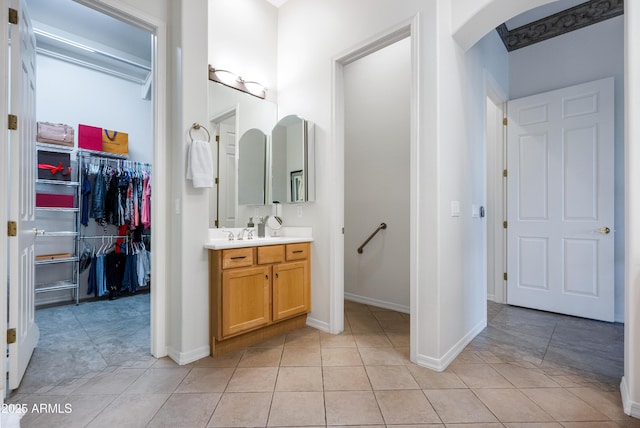 bathroom featuring tile patterned floors and vanity