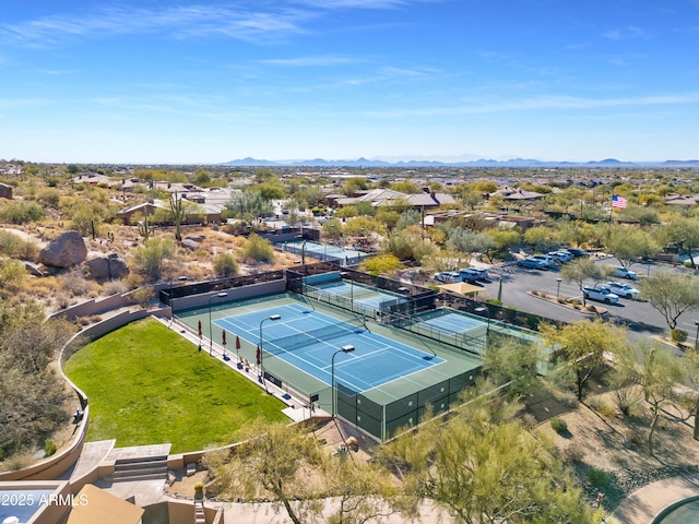 birds eye view of property featuring a mountain view