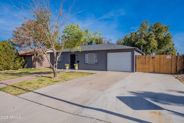 single story home featuring a garage