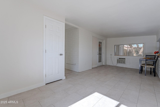 interior space with a wall mounted air conditioner