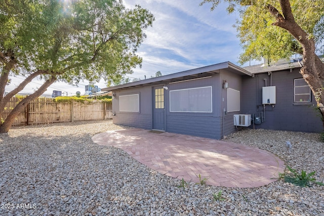 back of house featuring a patio