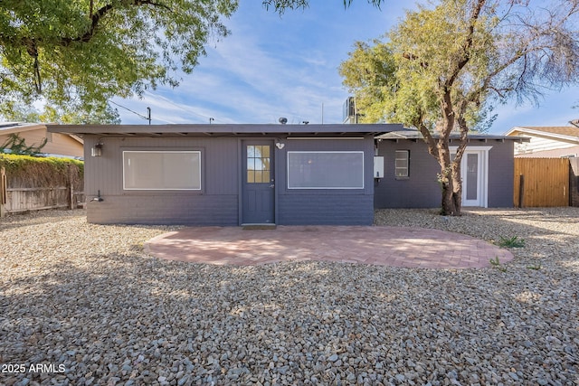 rear view of house featuring a patio area