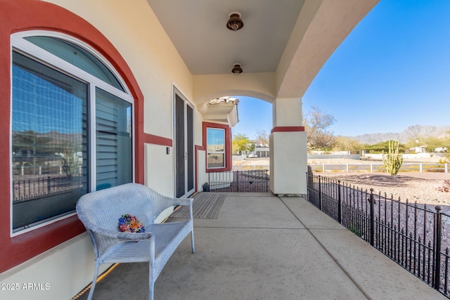 view of patio / terrace with a mountain view