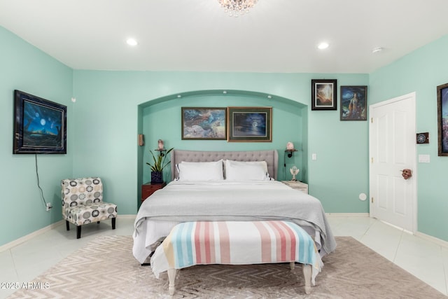 bedroom with light tile patterned flooring