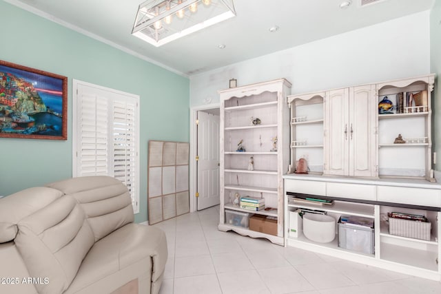 office space with crown molding and light tile patterned floors