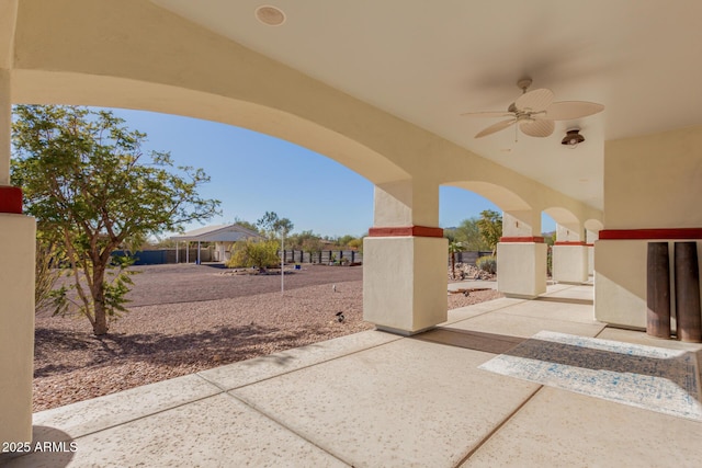 view of patio / terrace featuring ceiling fan