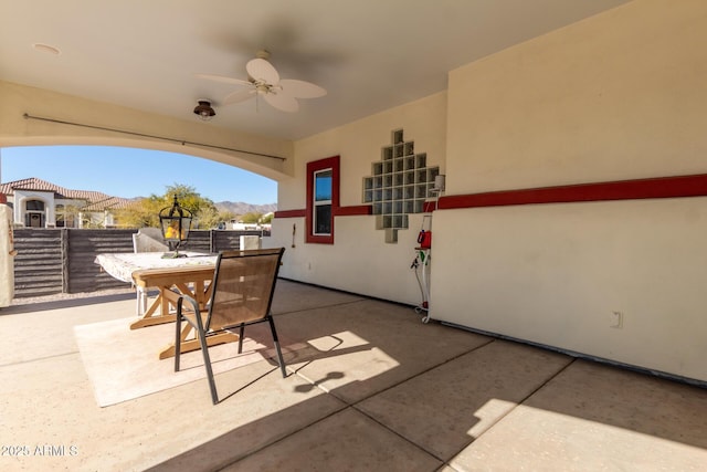 view of patio featuring ceiling fan