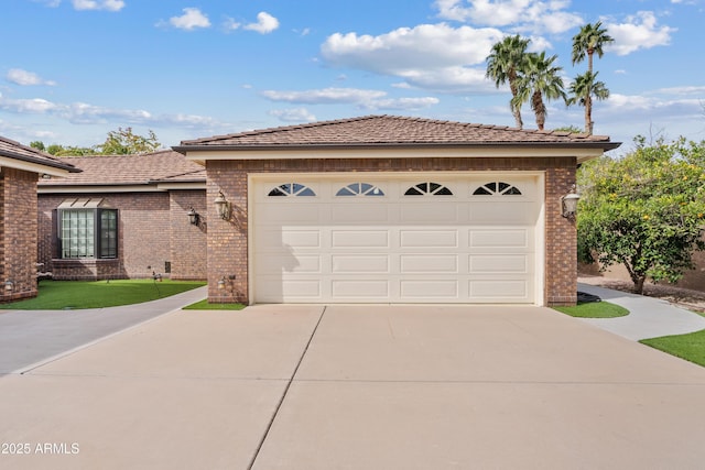 ranch-style home featuring a garage