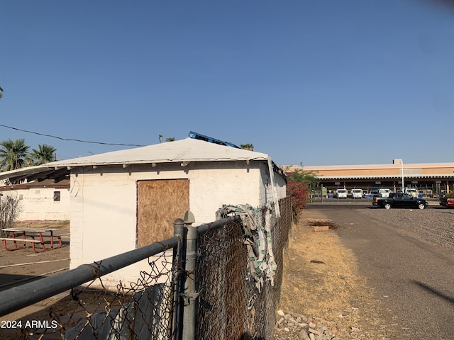 1202 S 14th St, Phoenix, AZ 85034 - view of side of home featuring fence