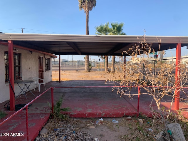 exterior space featuring a carport