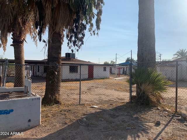 view of yard with central air condition unit