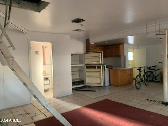 kitchen featuring light tile patterned flooring