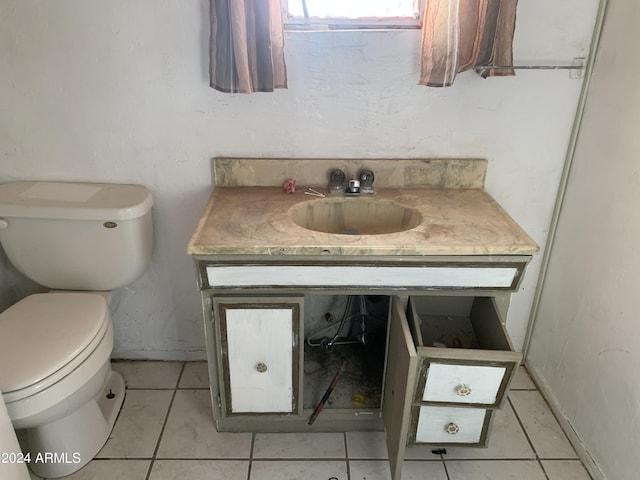 1202 S 14th St, Phoenix, AZ 85034 - bathroom featuring vanity, toilet, and tile patterned flooring