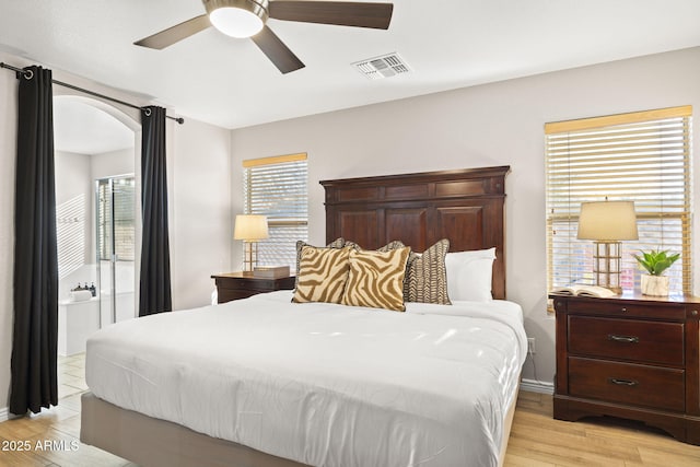 4111 S Dewdrop Ct, Gilbert, AZ 85297 - bedroom with light wood-type flooring and ceiling fan