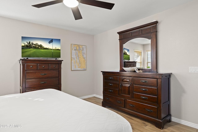 4111 S Dewdrop Ct, Gilbert, AZ 85297 - bedroom with light wood-style flooring and a ceiling fan