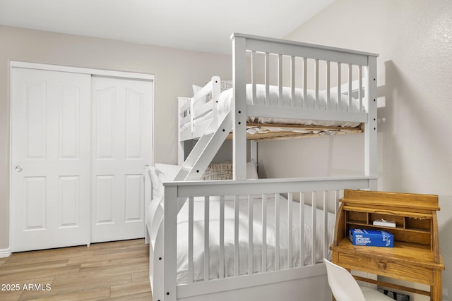 4111 S Dewdrop Ct, Gilbert, AZ 85297 - bedroom featuring wood finished floors and a closet