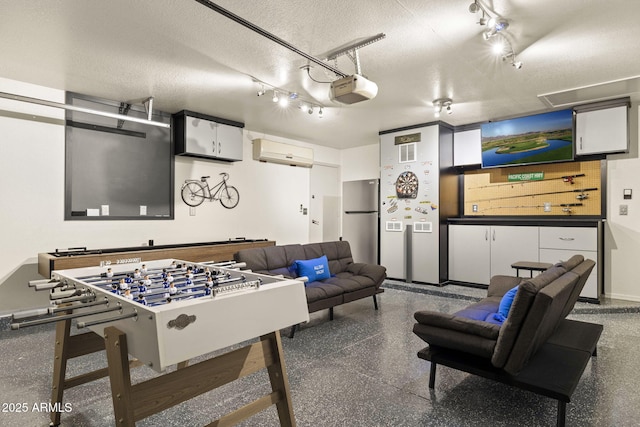 4111 S Dewdrop Ct, Gilbert, AZ 85297 - rec room with a wall mounted AC and rail lighting