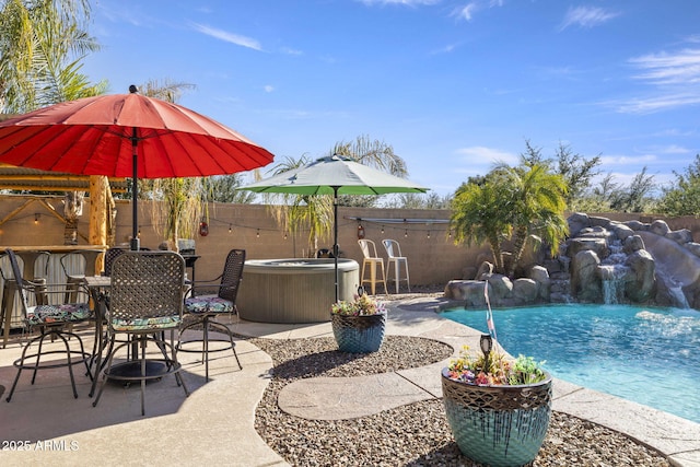 4111 S Dewdrop Ct, Gilbert, AZ 85297 - outdoor pool with a hot tub, a fenced backyard, and a patio area