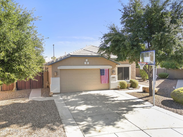 4111 S Dewdrop Ct, Gilbert, AZ 85297 - view of front of property featuring an attached garage, concrete driveway, stucco siding, and a tile roof