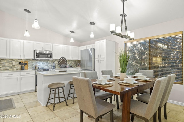 4111 S Dewdrop Ct, Gilbert, AZ 85297 - dining area featuring lofted ceiling and light tile patterned flooring