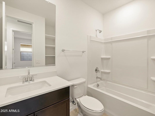 bathroom featuring shower / bath combination, vanity, and toilet