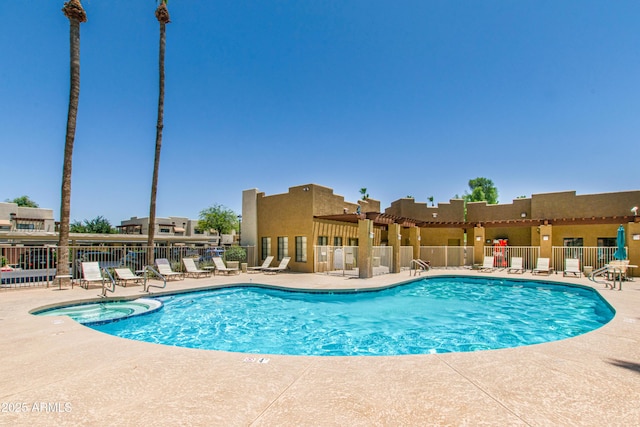 3434 E Baseline Rd Unit 214, Phoenix, AZ 85042 - view of swimming pool with a patio area and a pool with connected hot tub