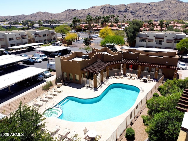 3434 E Baseline Rd Unit 214, Phoenix, AZ 85042 - view of pool with a pool with connected hot tub, a mountain view, and a patio area