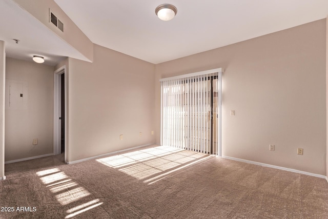 3434 E Baseline Rd Unit 214, Phoenix, AZ 85042 - carpeted empty room with baseboards and electric panel