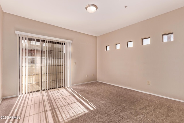 3434 E Baseline Rd Unit 214, Phoenix, AZ 85042 - spare room featuring carpet floors and baseboards
